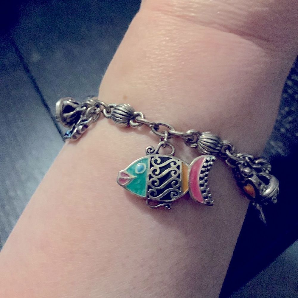 Gorgeous, Brighton, fish, and a heart bracelet.